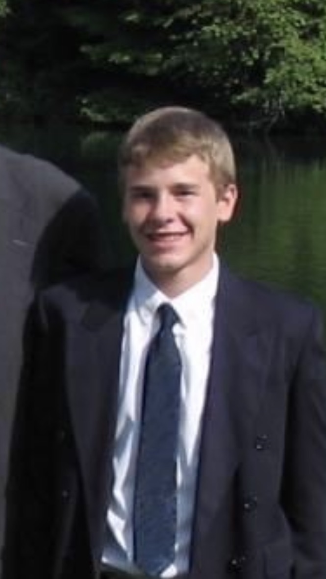 Mikey - Smiling, fake, sadder, age ~13